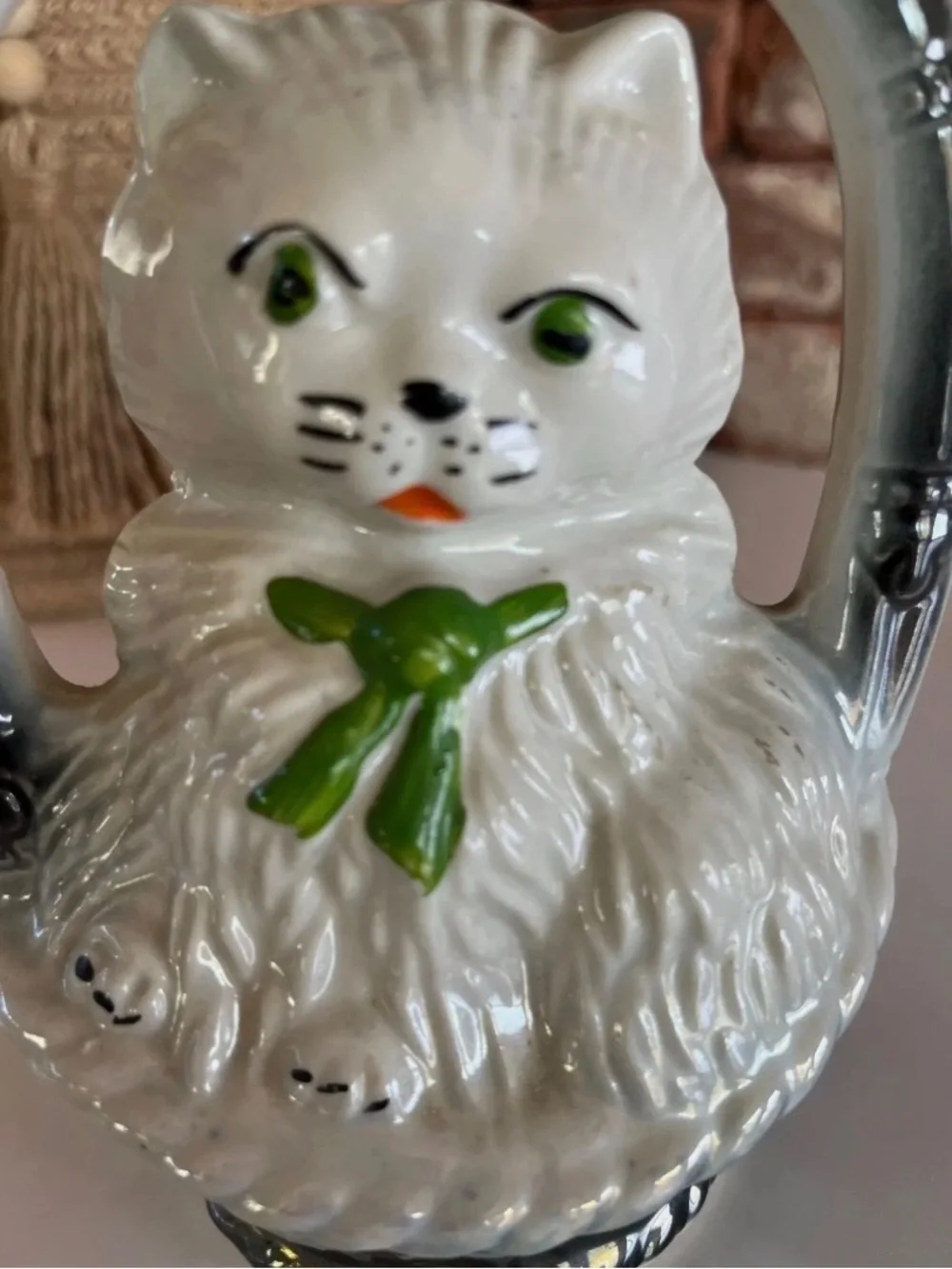 Vintage 1950’s Japan White Ceramic Cat Figurine with Green Bow and Silver Handle